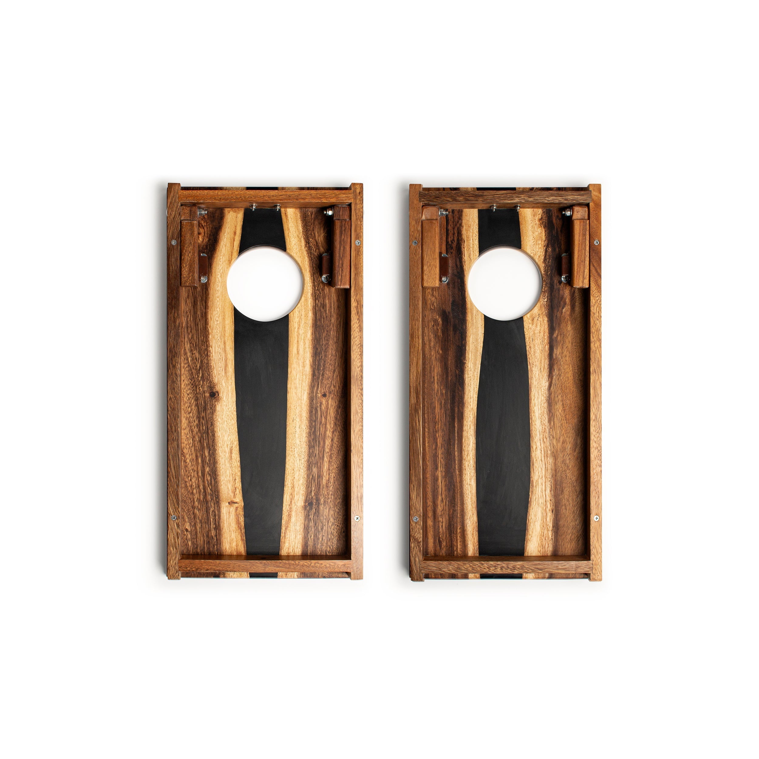 Two wooden cornhole boards with a black and white design on a white background