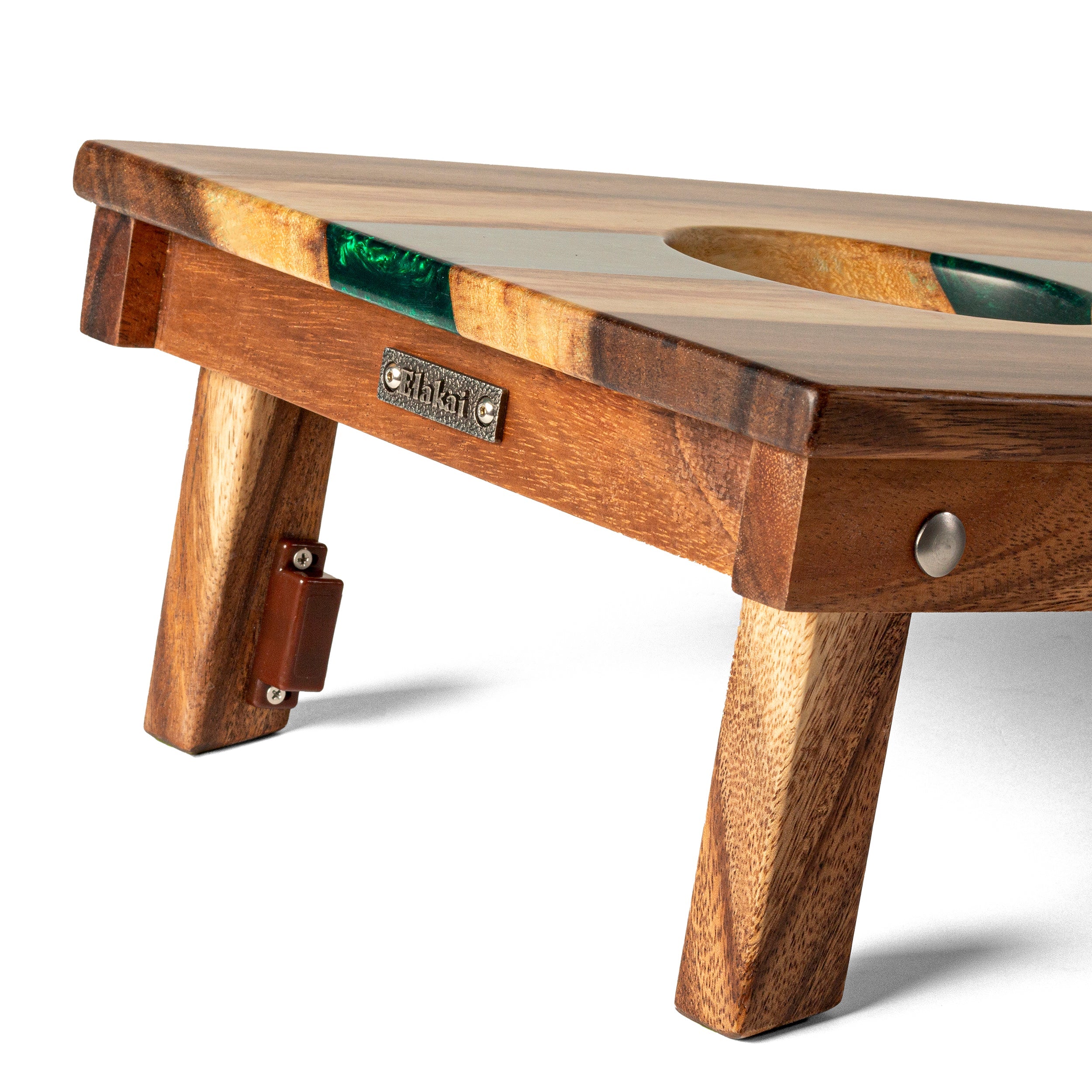 Wooden table with a visible brand logo on a white background