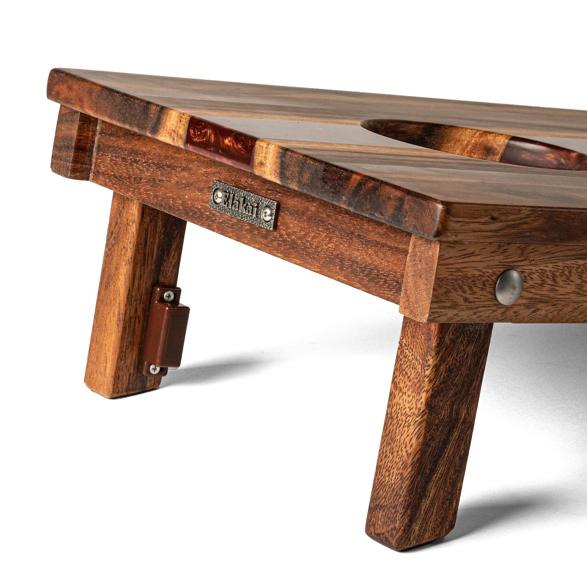 Wooden dog bed with a brand label on a white background