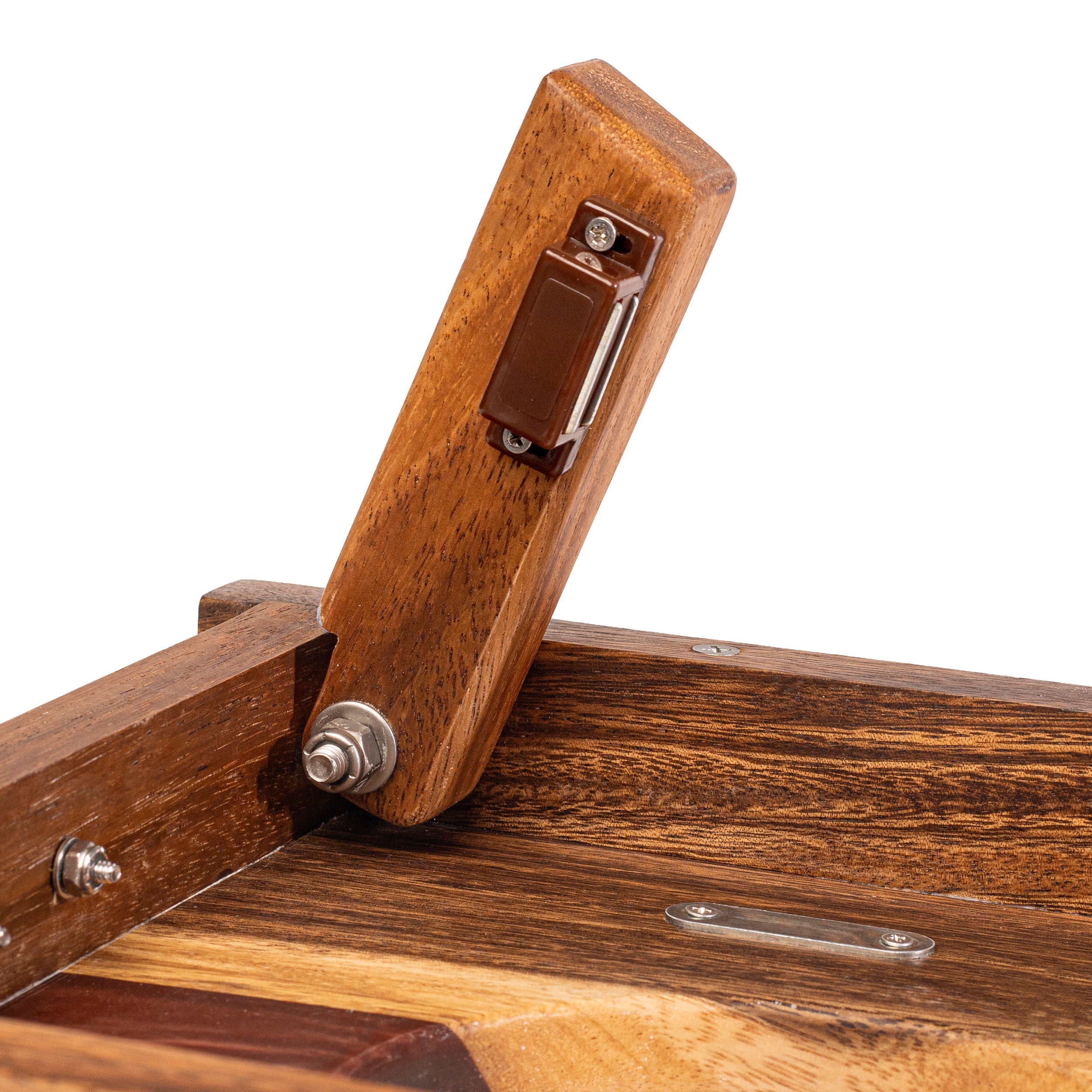 Close-up of a wooden product with metal fasteners on a white background