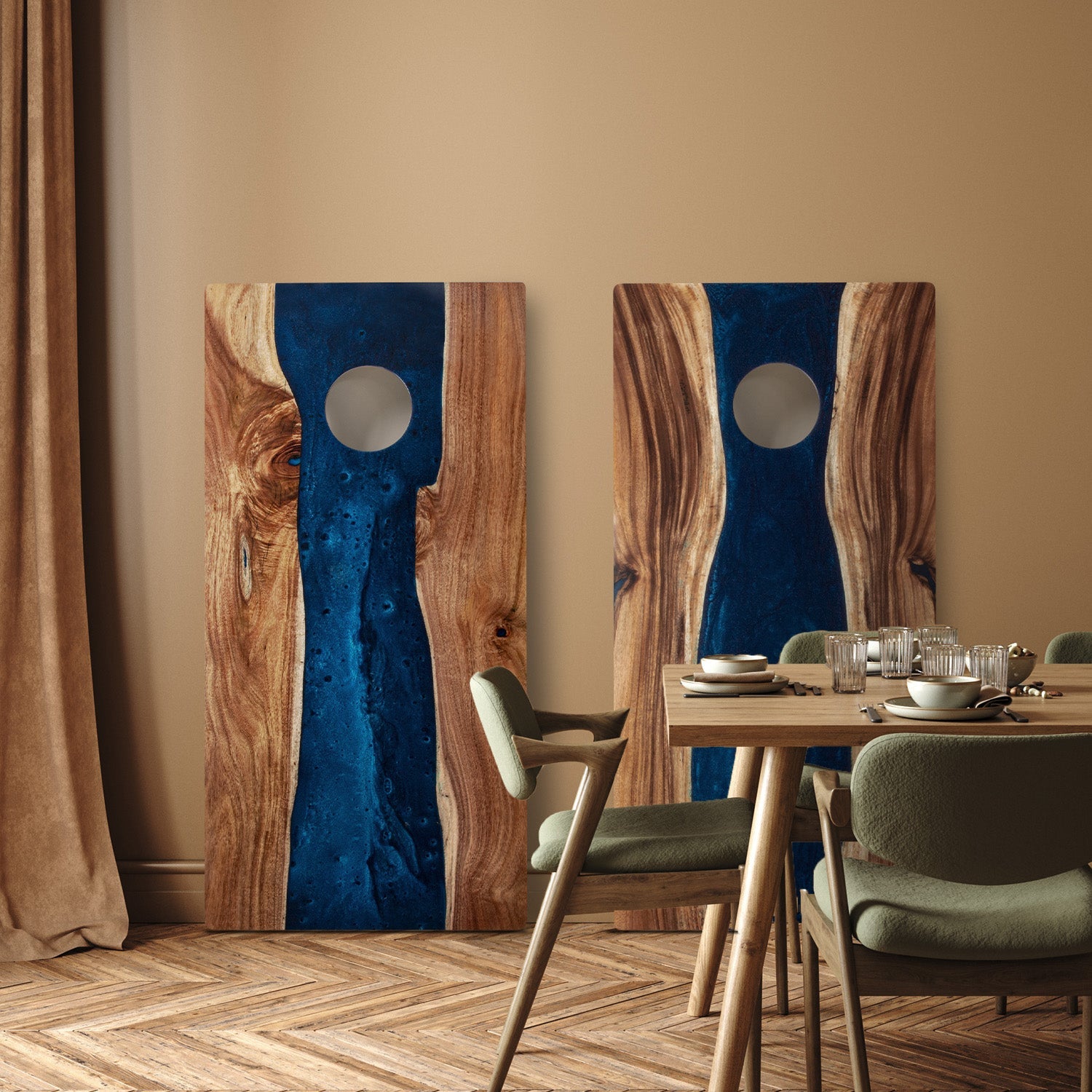 Dining room with wooden table and chairs, and abstract wall art.