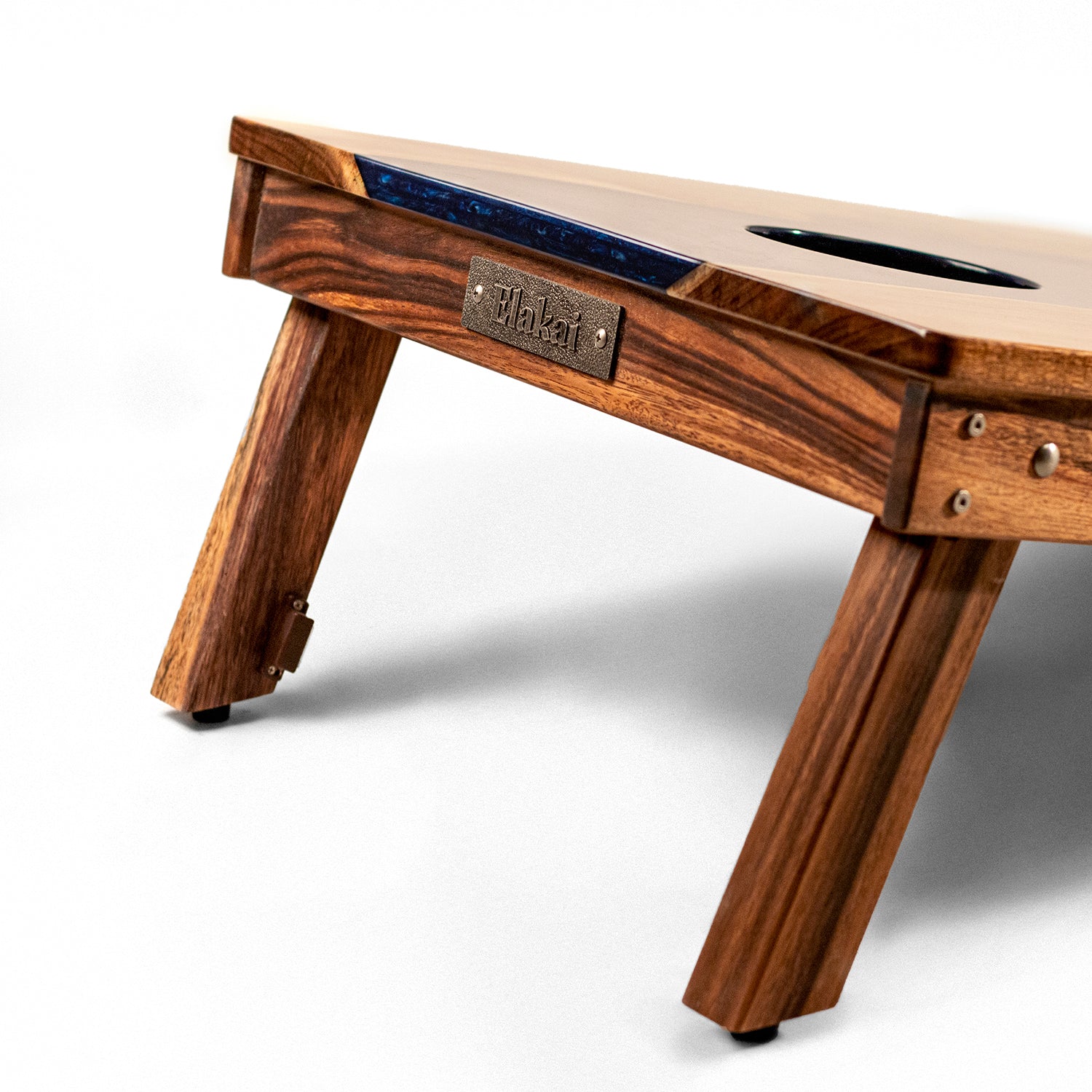 Wooden cornhole board with 'Blaket' branding on a white background