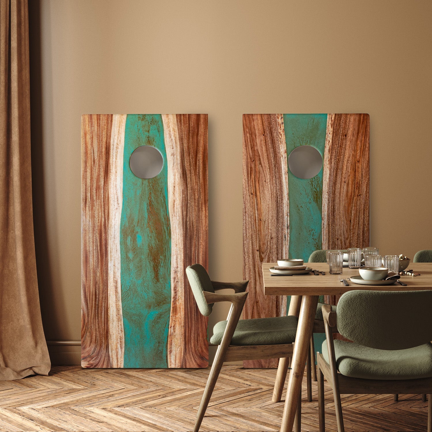 Dining room with wooden table and chairs, and two large abstract wall hangings.