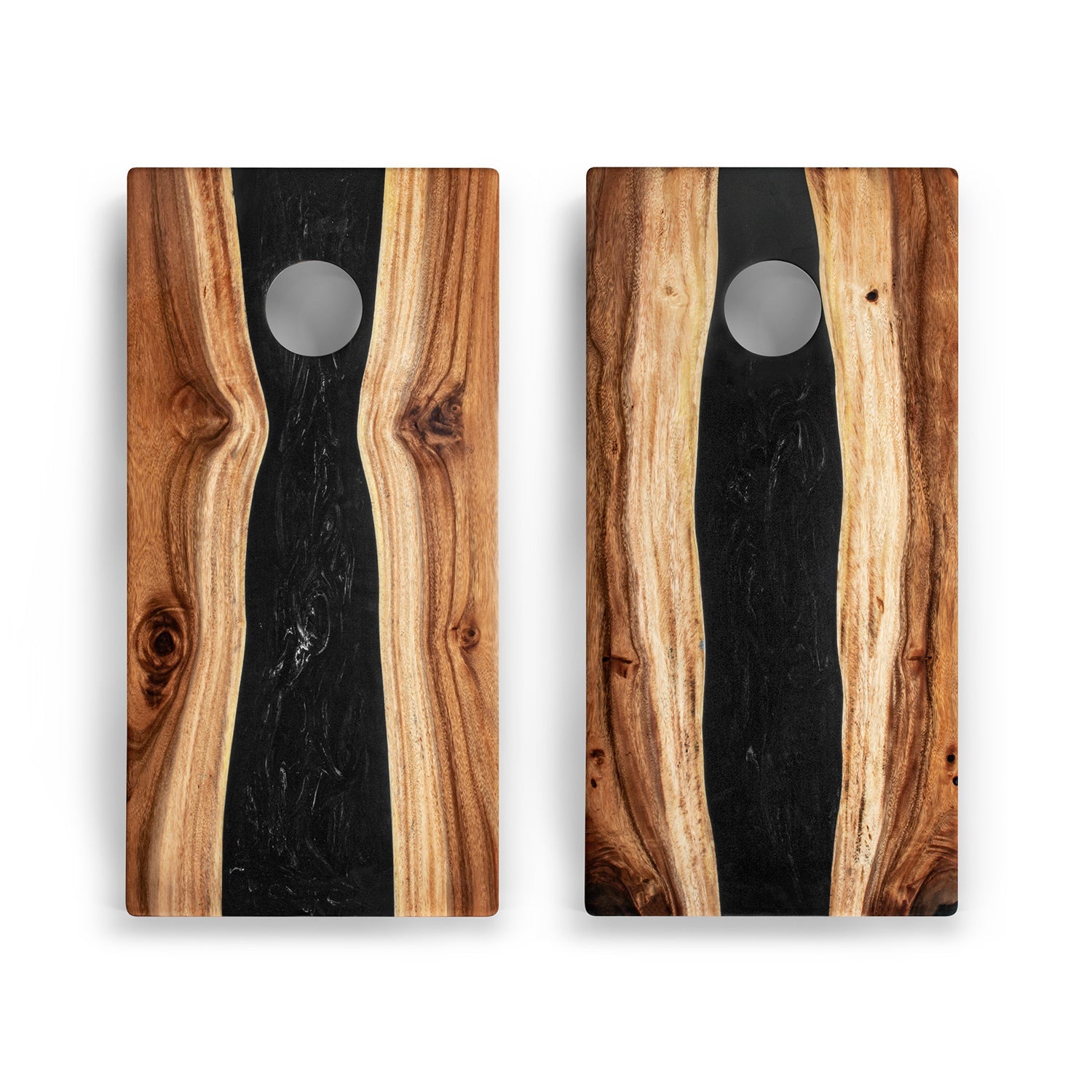Two wooden cutting boards with black marble-like centers on a white background
