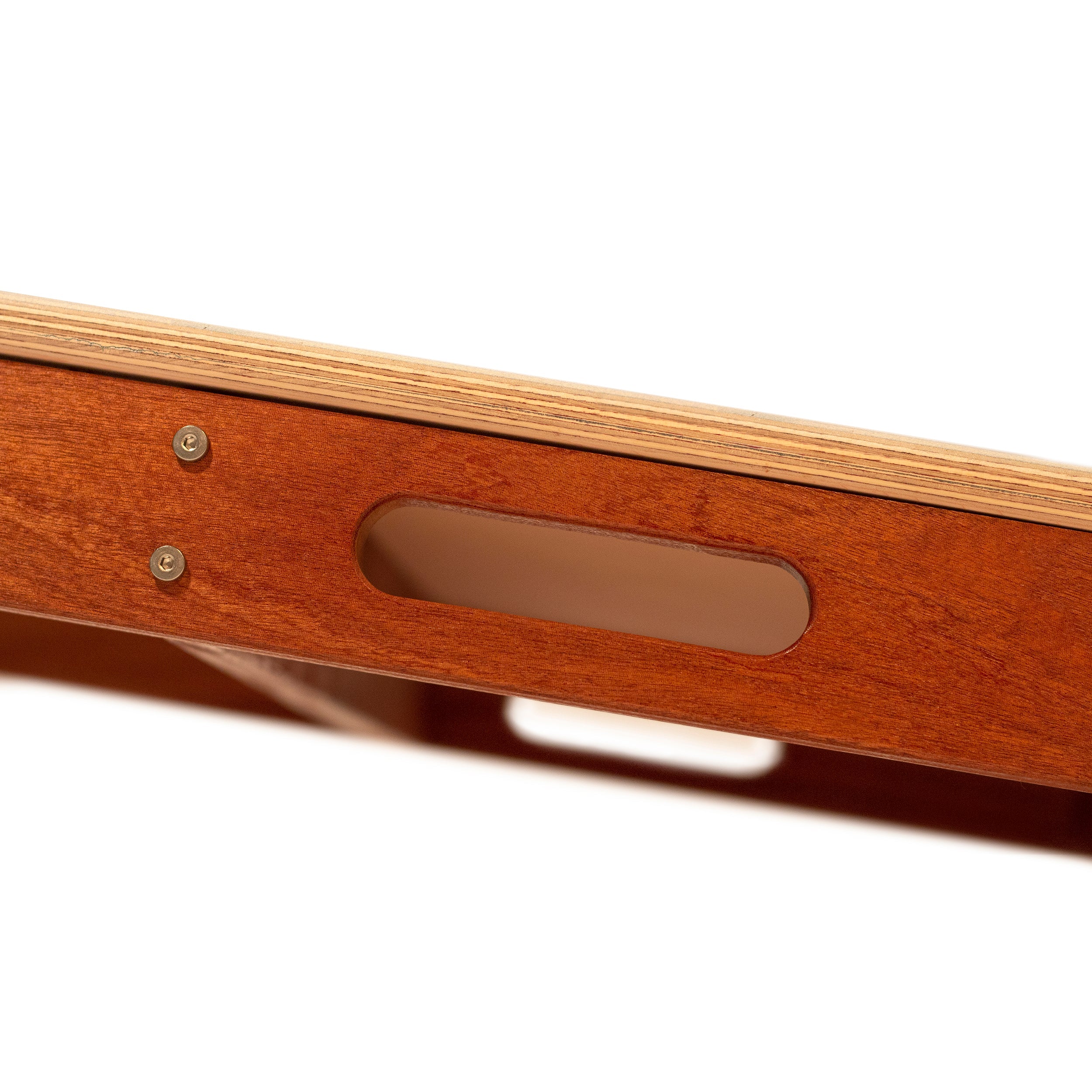 Close-up of a wooden ruler with a clear plastic insert on a white background