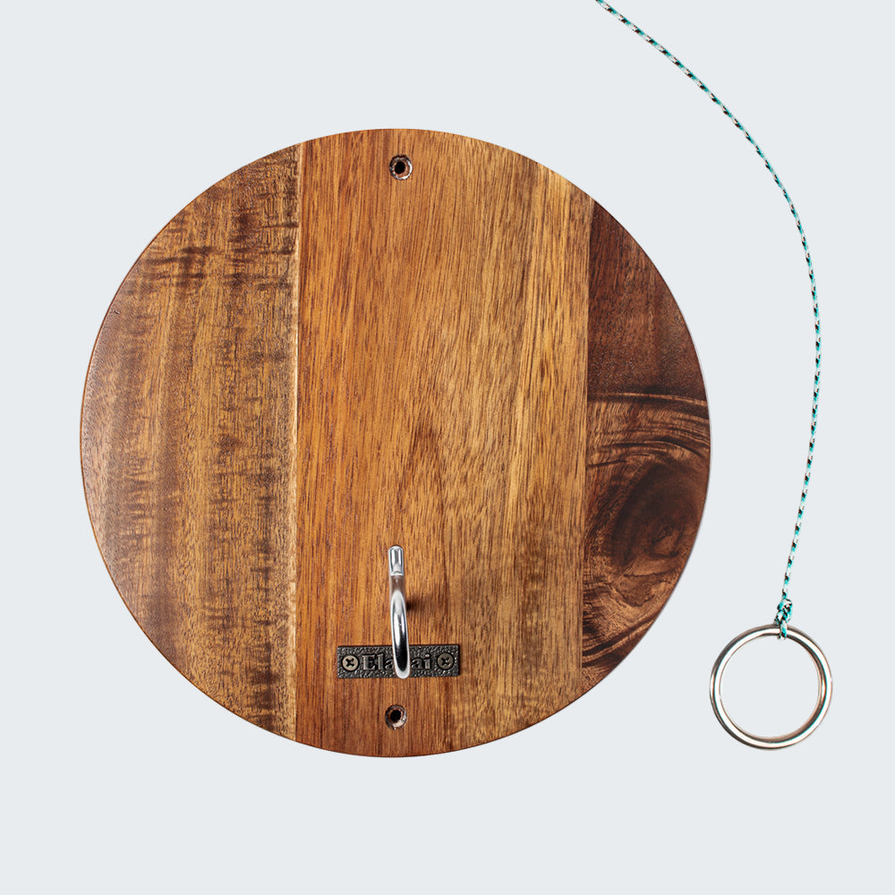 Wooden circular wall hook with metal rings on a white background