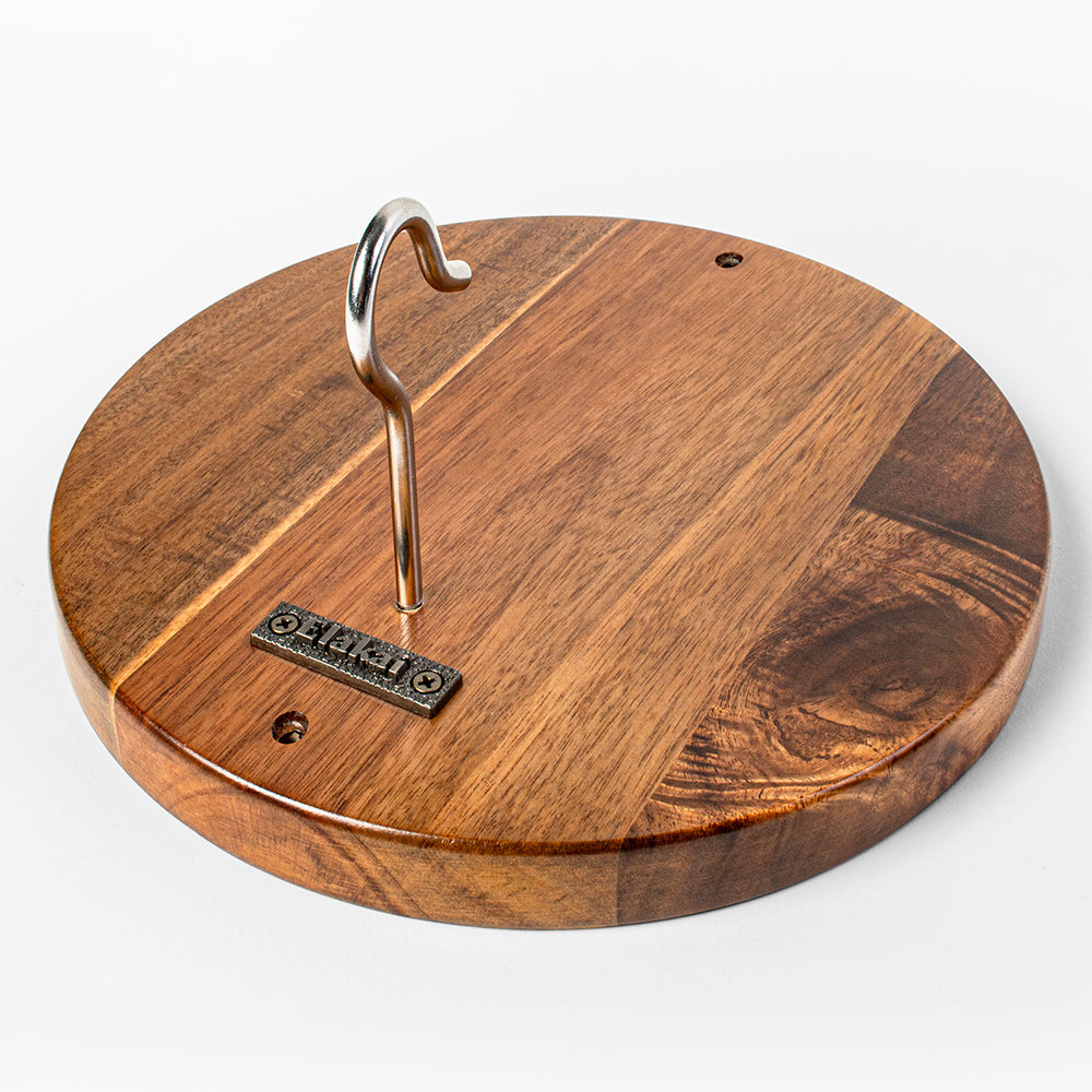 Wooden lid with a metal hook on a white background