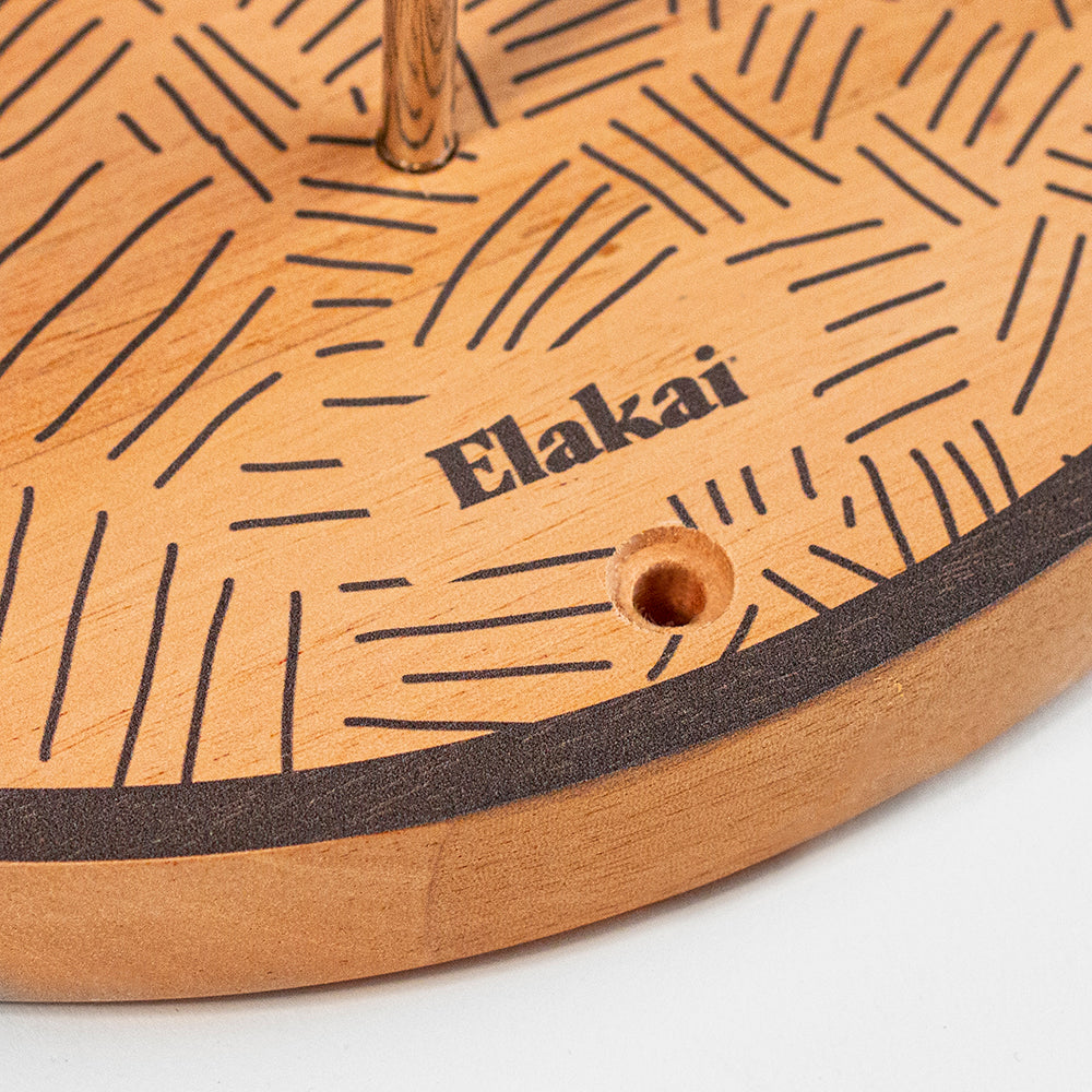 Wooden product with 'Elakai' branding on a white background