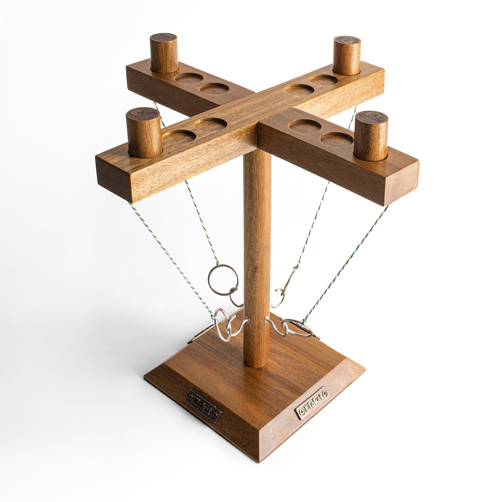 Wooden balance scale toy on a white background