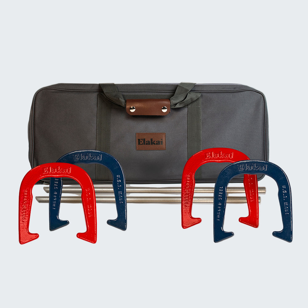 Set of red and blue horseshoes with a gray Elako carrying case on a white background