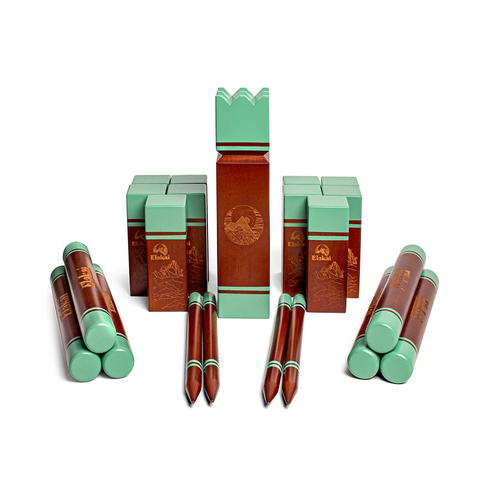 Collection of wooden pens and boxes with green accents on a white background