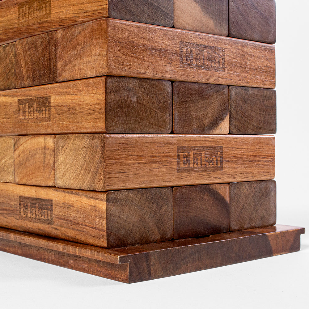 Stack of wooden blocks with visible branding on a white background