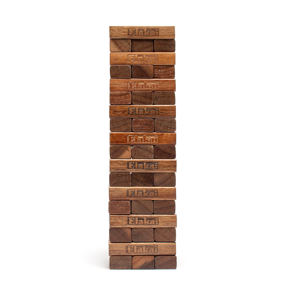 Stack of wooden blocks with 'Elakal' branding on a white background