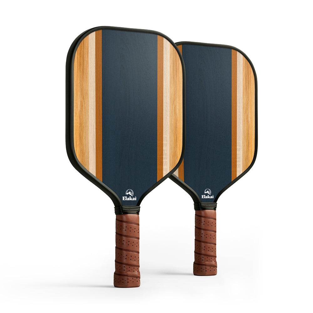 Two pickleball paddles with striped design and wooden handles on a white background