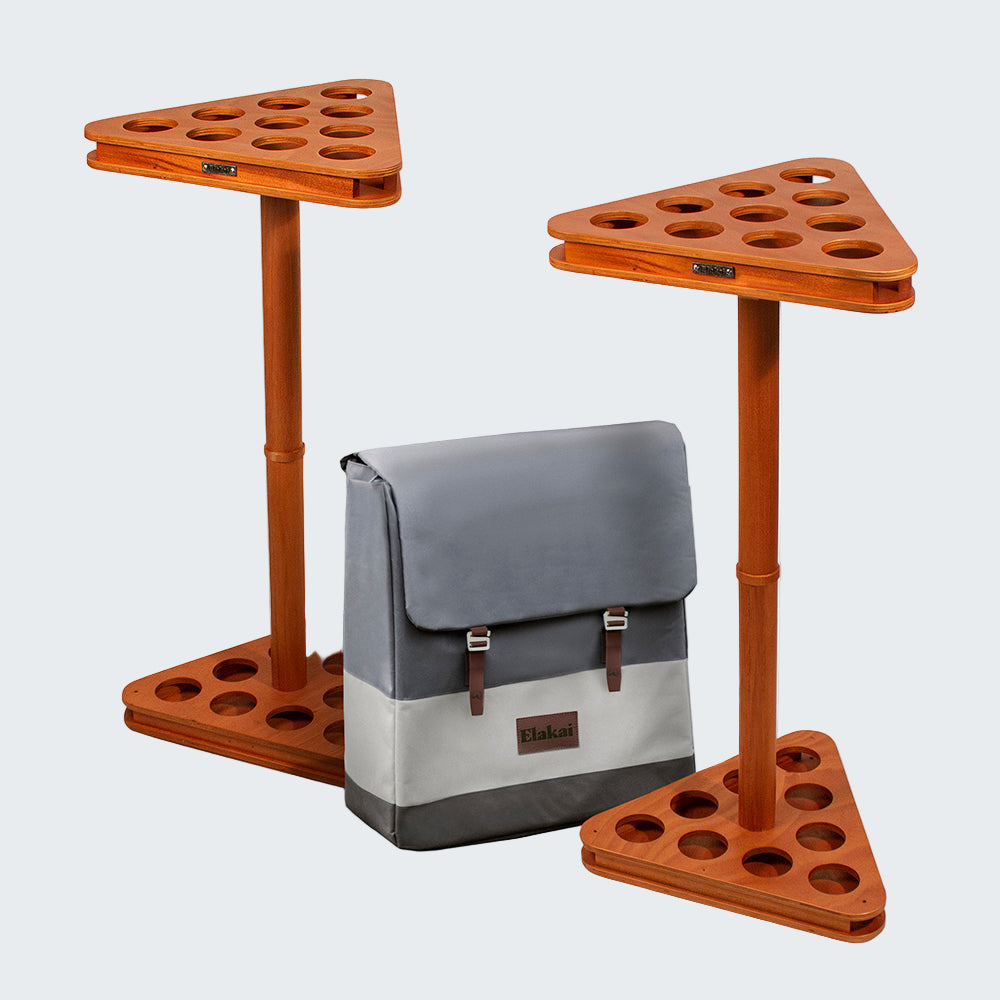 Two triangular wooden stands with multiple holes and a gray bag on a white background