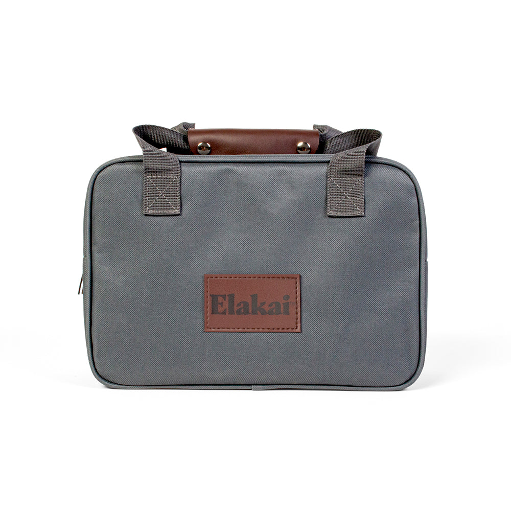 Gray bag with brown handle and Elakai logo on a white background