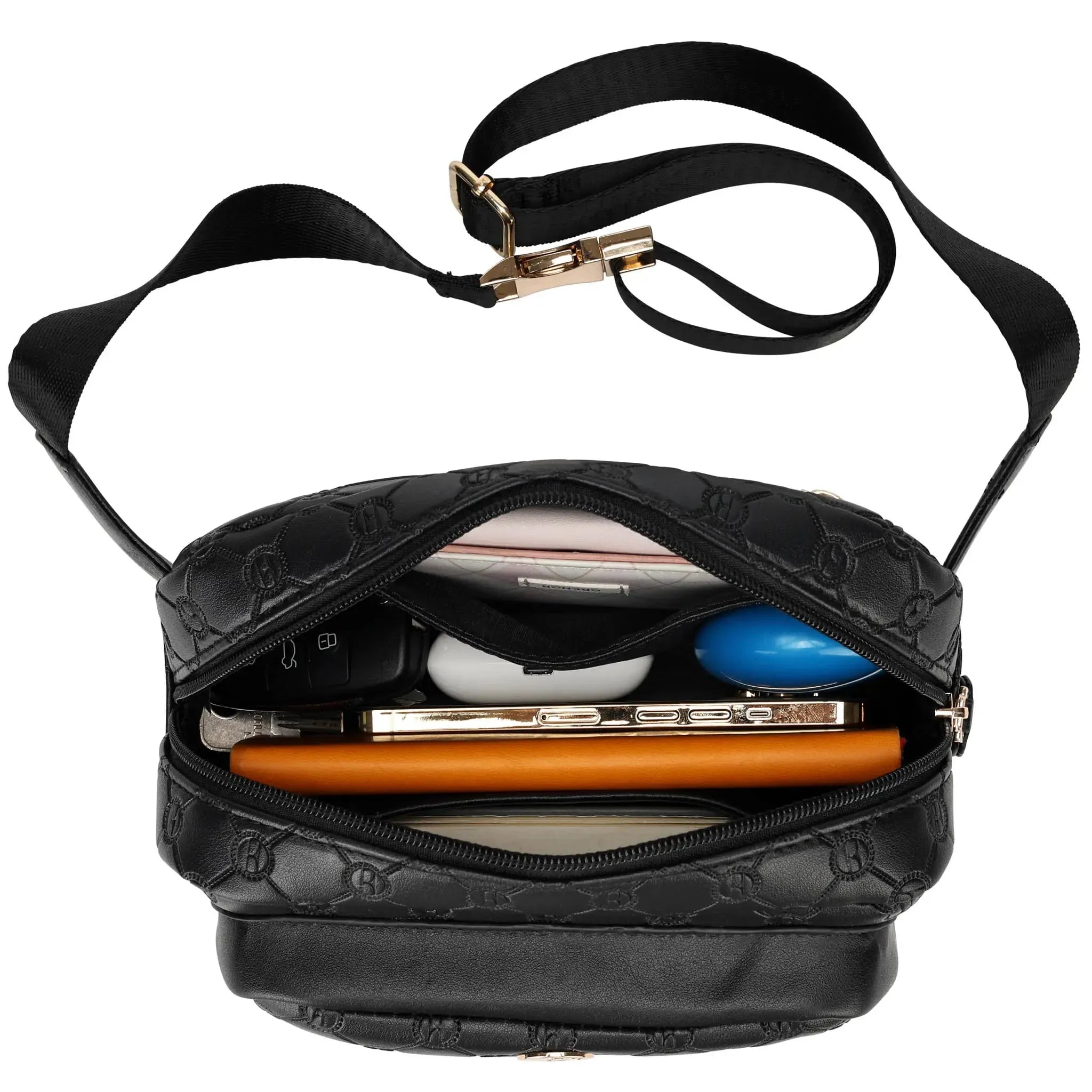 Black handbag with a gold clasp, containing a smartphone and other items on a white background
