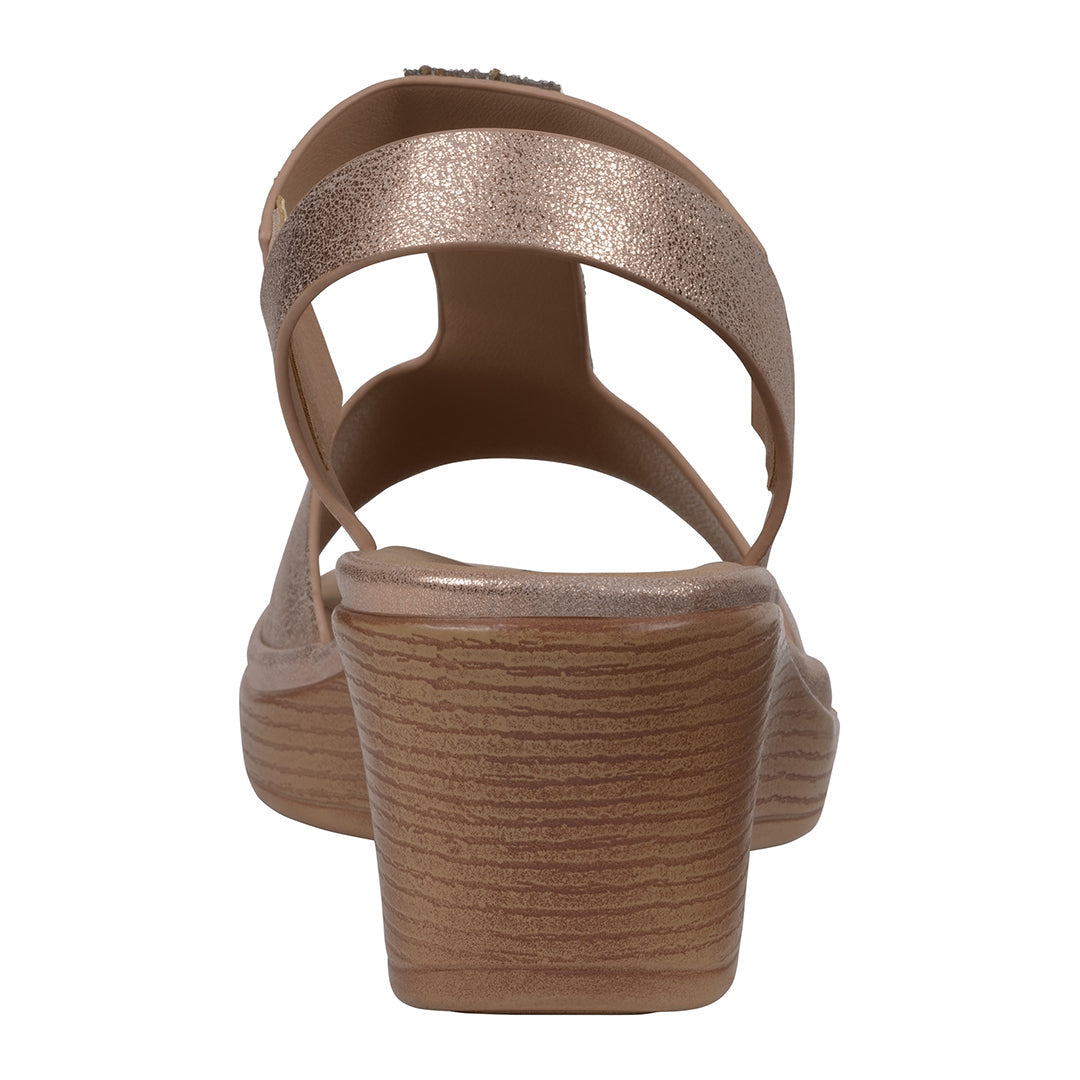 Brown sandal with a platform sole on a white background