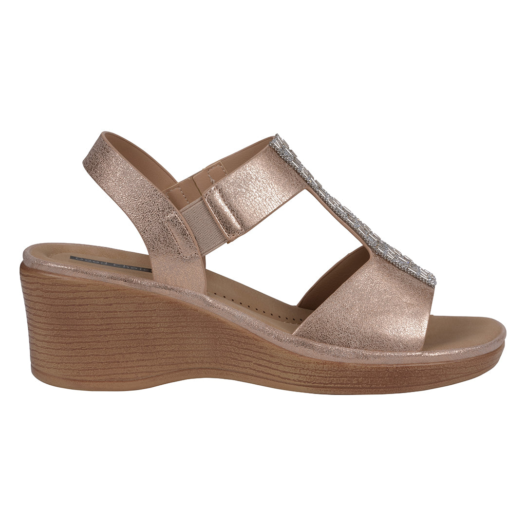 Rose gold wedge sandal on a white background