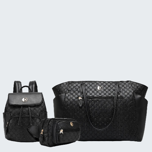 Black quilted handbag, backpack, and small pouch on a white background