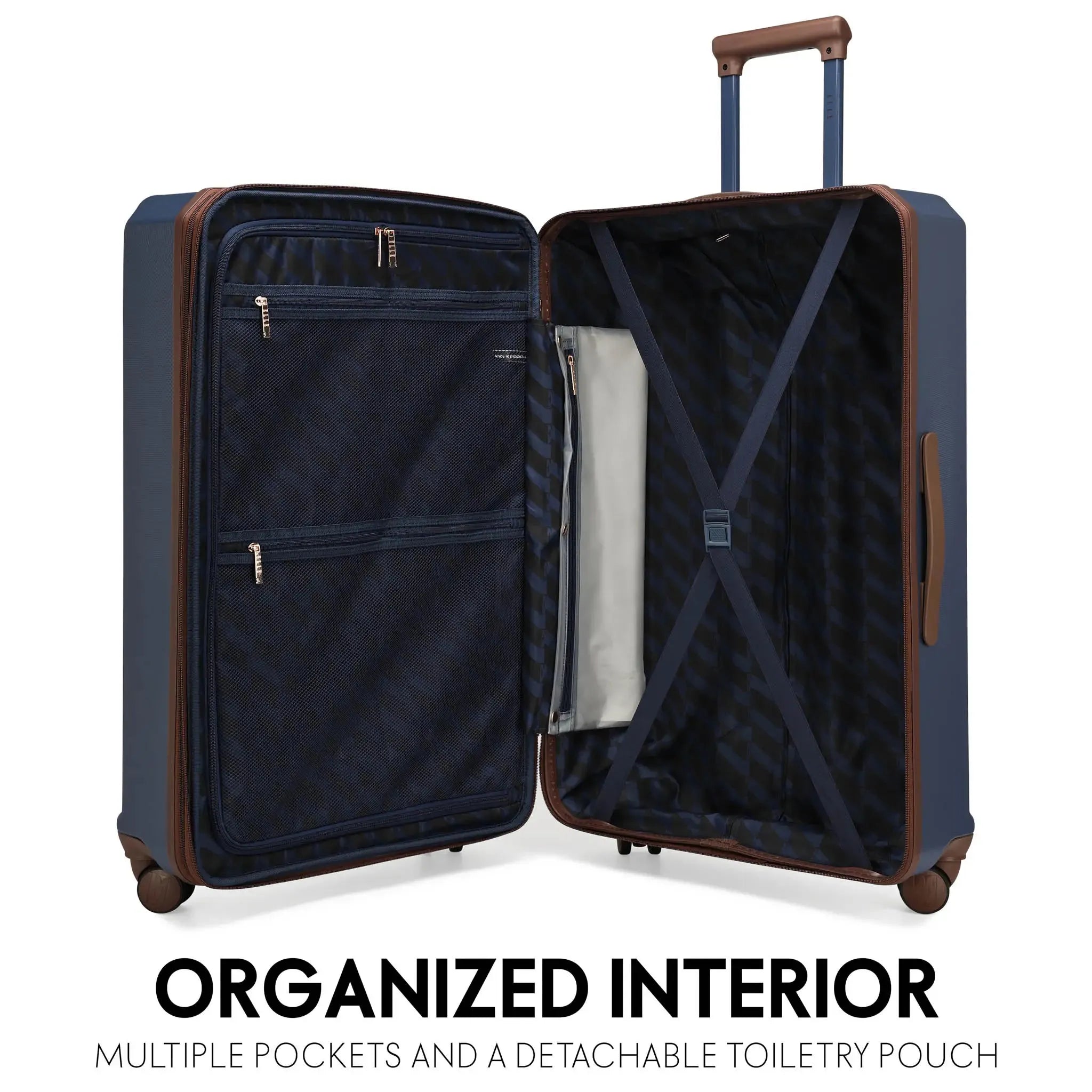 Open navy suitcase with multiple pockets and a detachable toiletry pouch on a white background