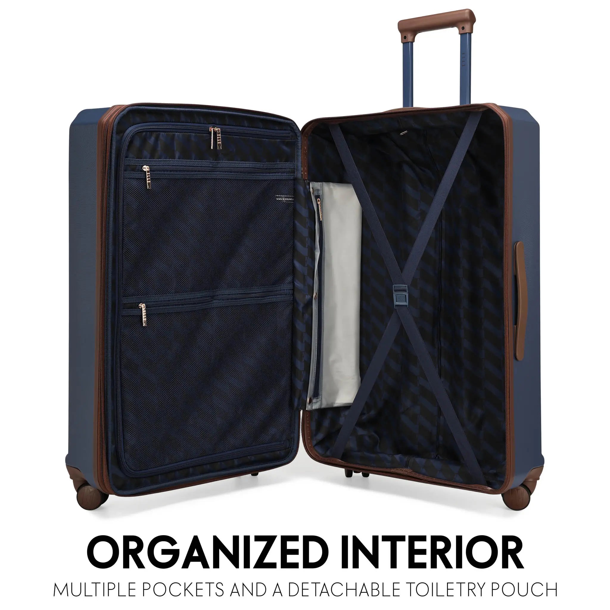 Open navy suitcase with multiple pockets and a detachable toiletry pouch on a white background