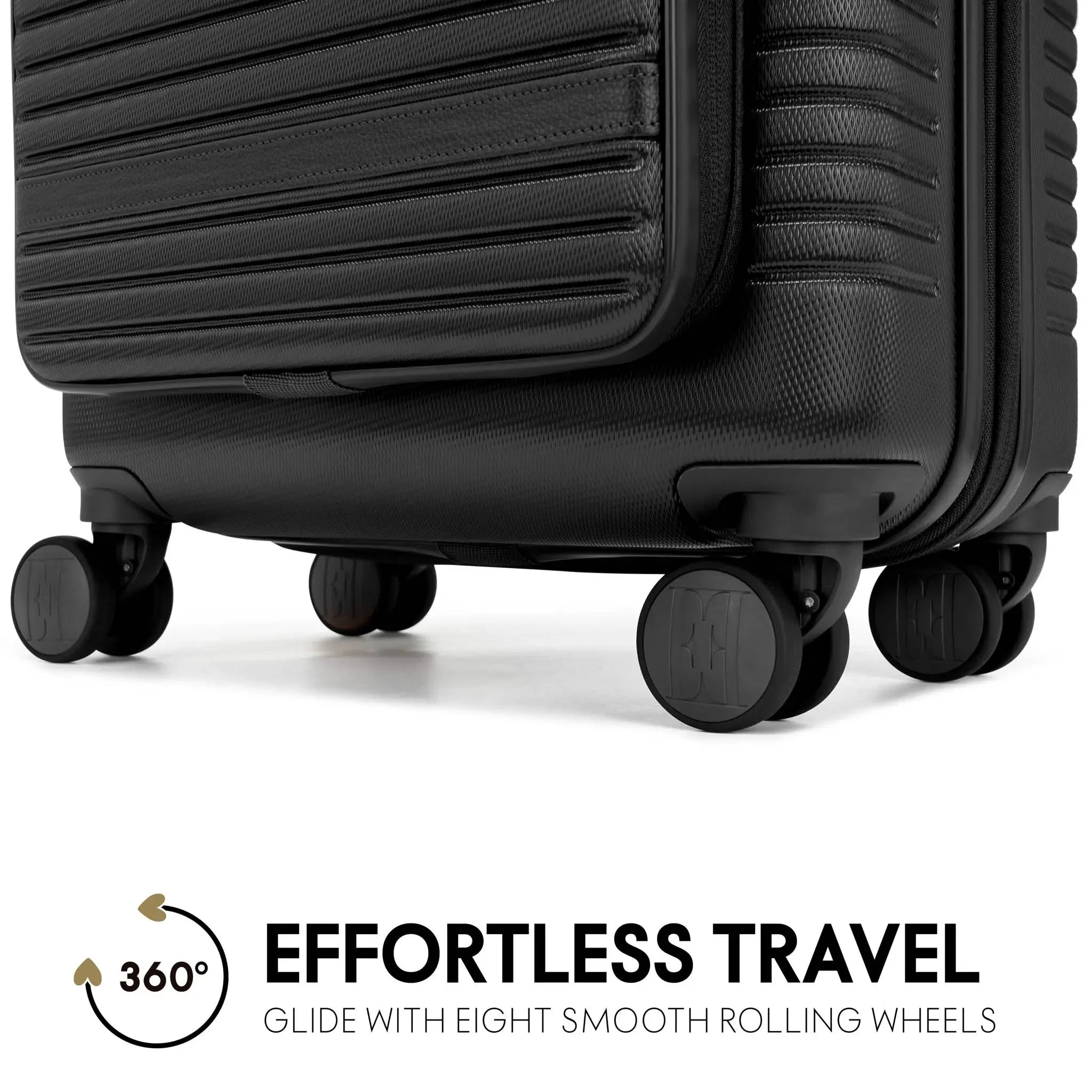 Black suitcase with eight smooth rolling wheels on a white background, featuring text 'Effortless Travel'.