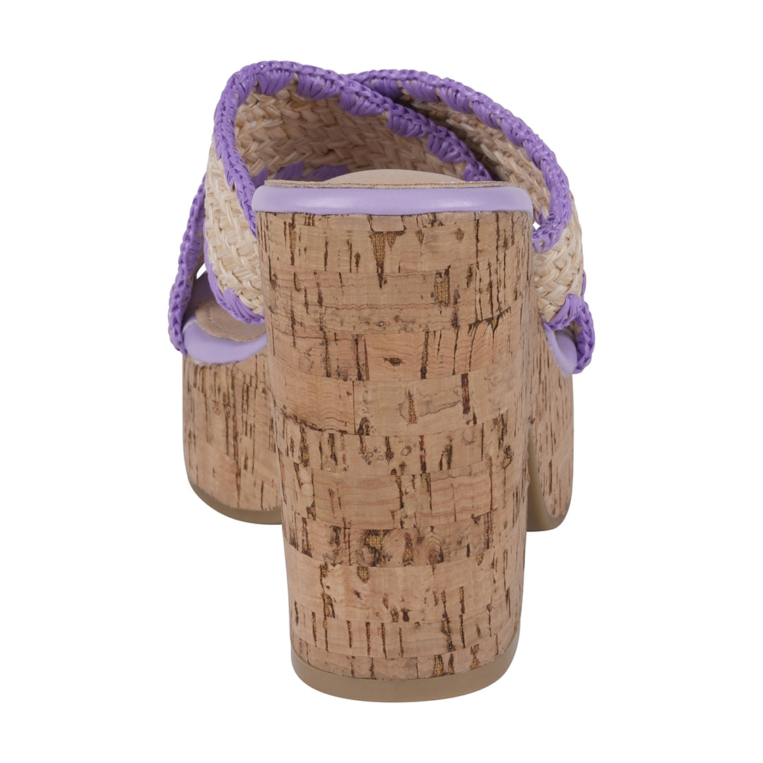 Wedge sandal with cork wedge and purple trim on a white background