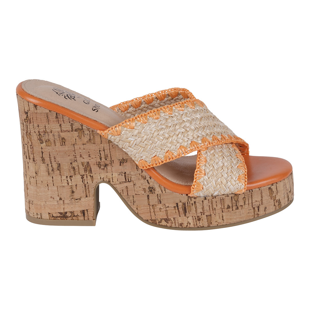 Cork wedge sandal with orange trim on a white background