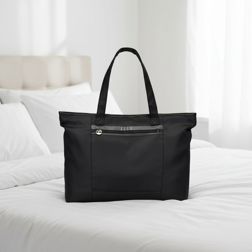 Black tote bag with 'ELLE' branding on a white background