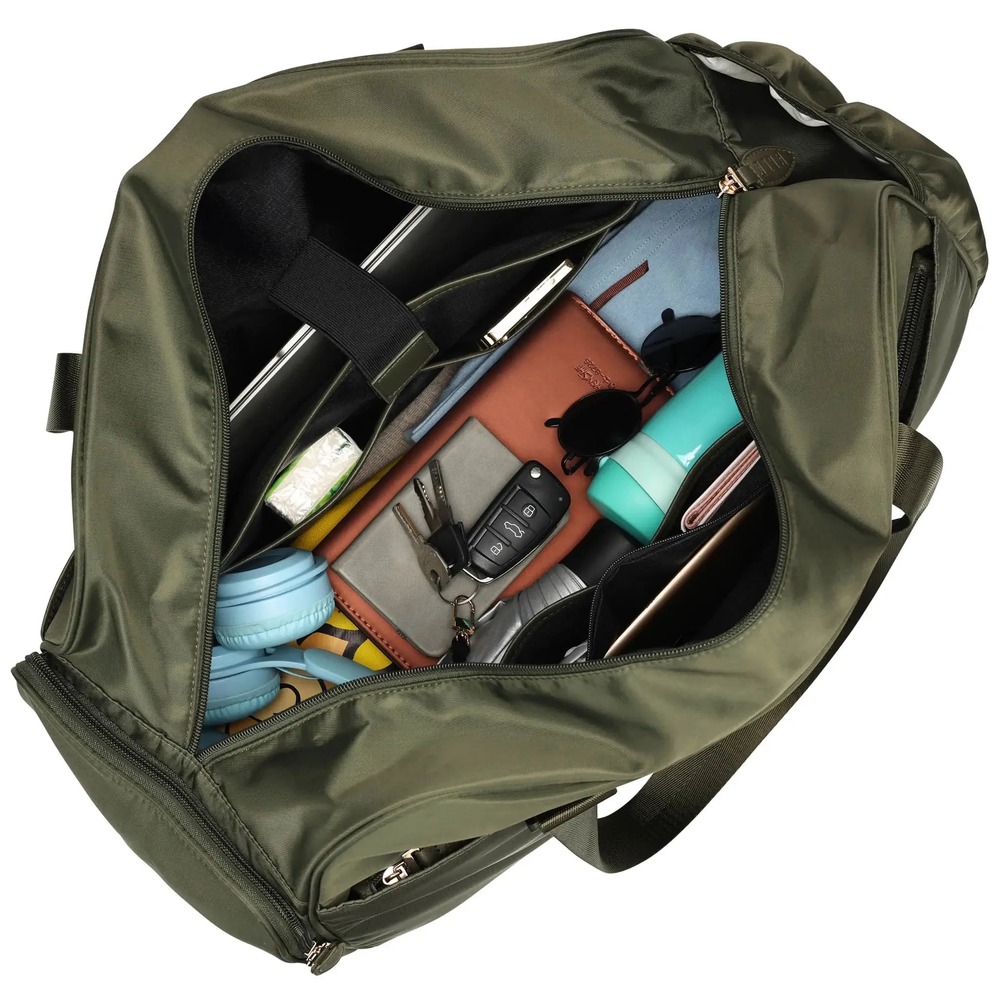 Green bag with various items including a phone and bottles on a white background