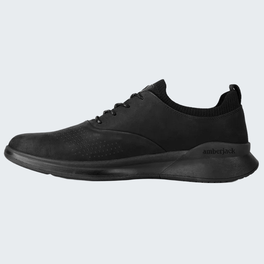 Black sneaker with 'amberjack' branding on a white background