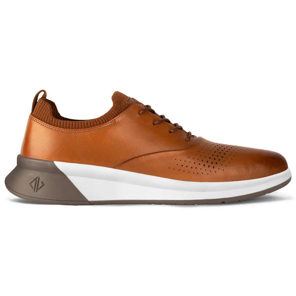 Brown leather shoe with a white sole on a white background