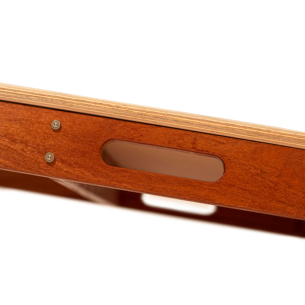 Close-up of a wooden product with a clear plastic insert on a white background