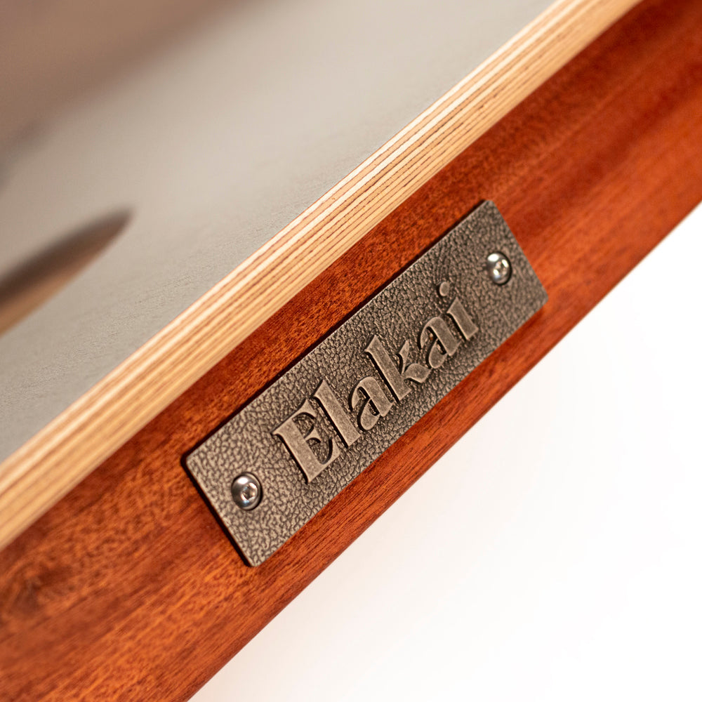 Wooden product with 'Elakai' branding on a neutral background
