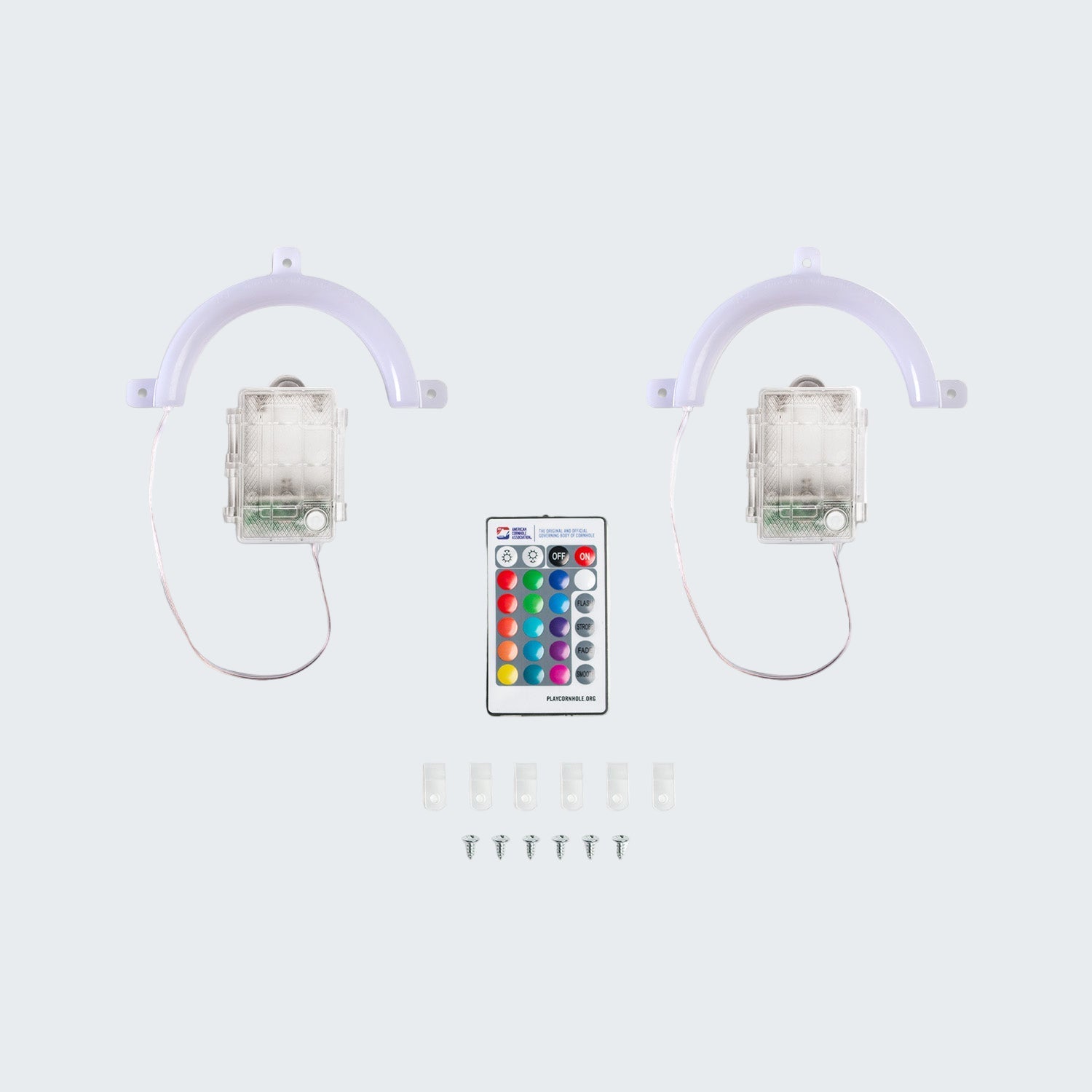 Two LED light fixtures with a remote control on a white background