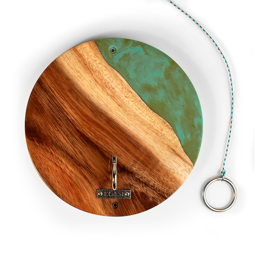 Wooden wall hook with green resin finish on a white background