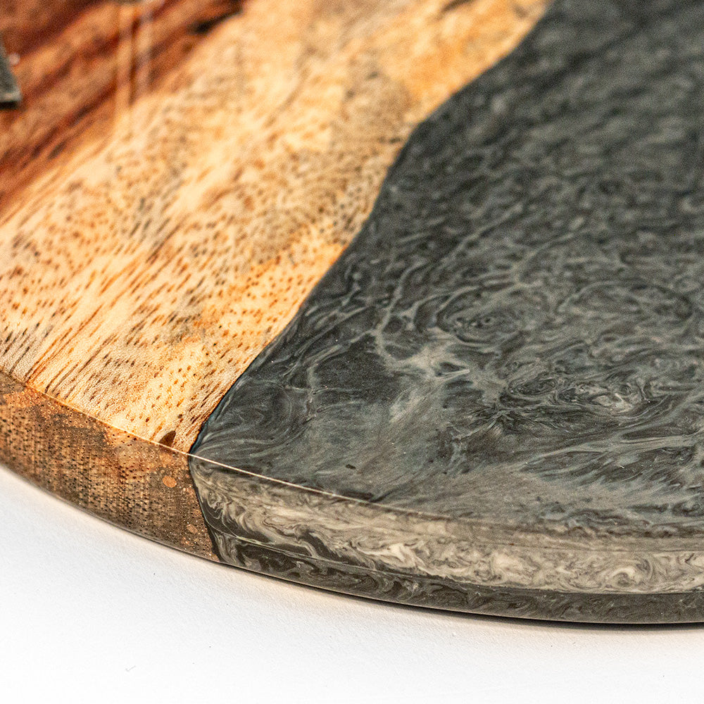 Close-up of a wooden and stone surface with a white background