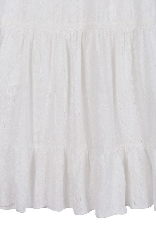 Embroidered White V Neckline Tiered Dress