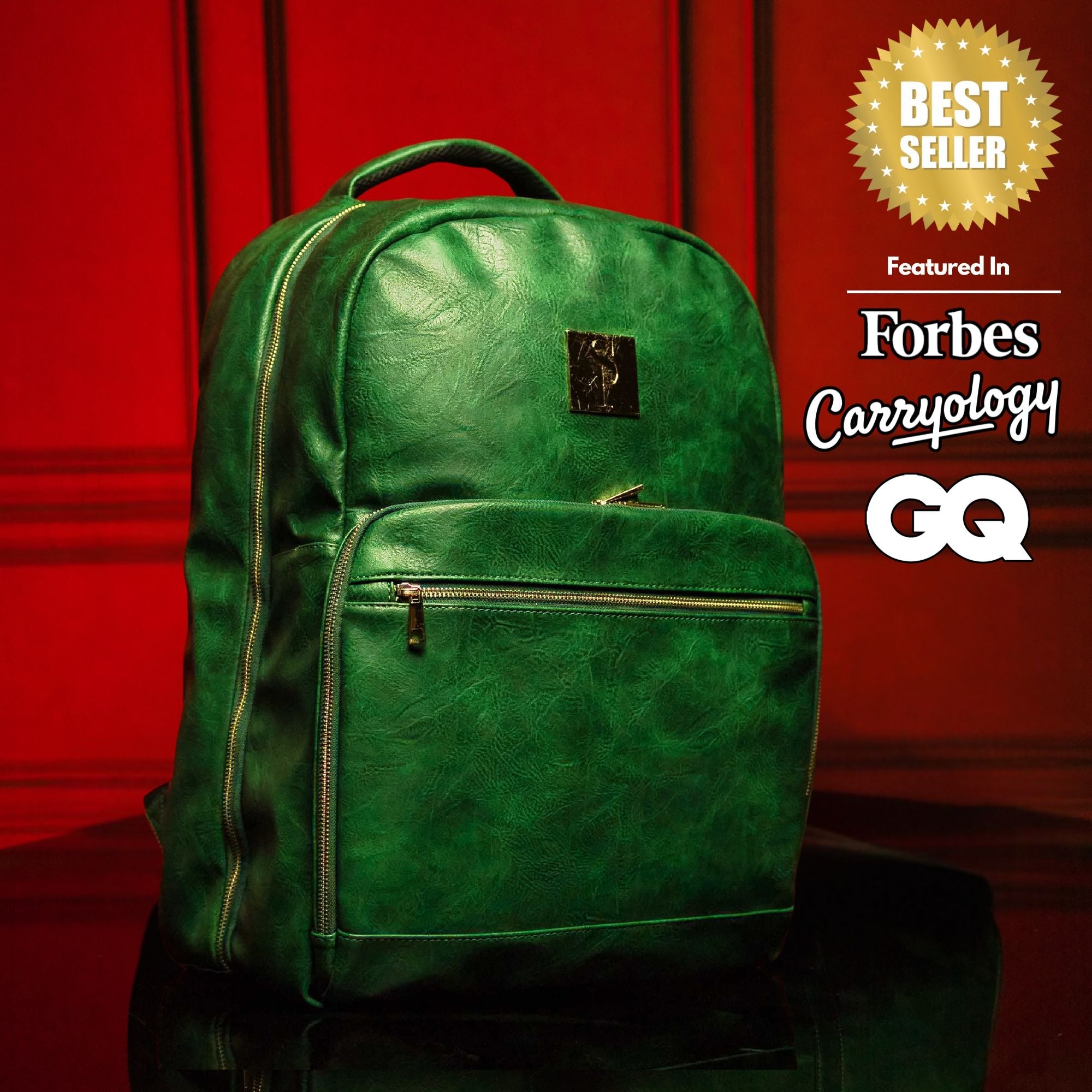 Green backpack on a reflective surface with a red background, featuring 'Forbes Carryology' and 'GQ' logos.