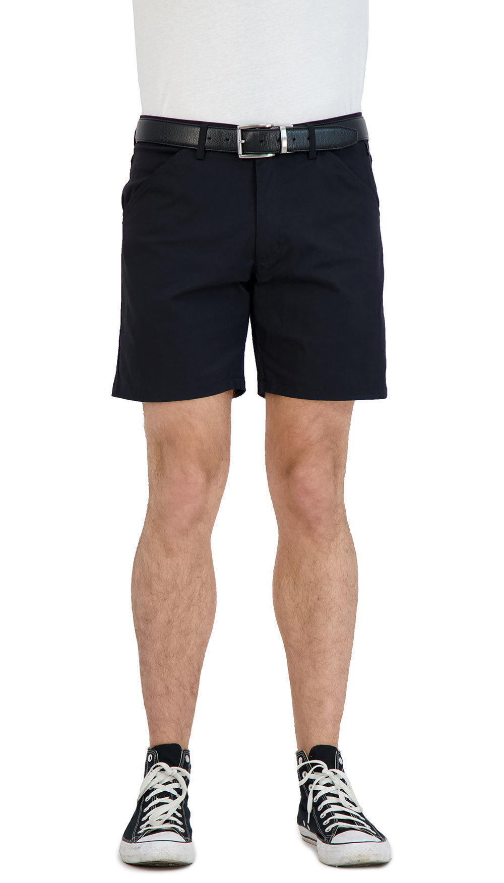 Person wearing black shorts on a white background