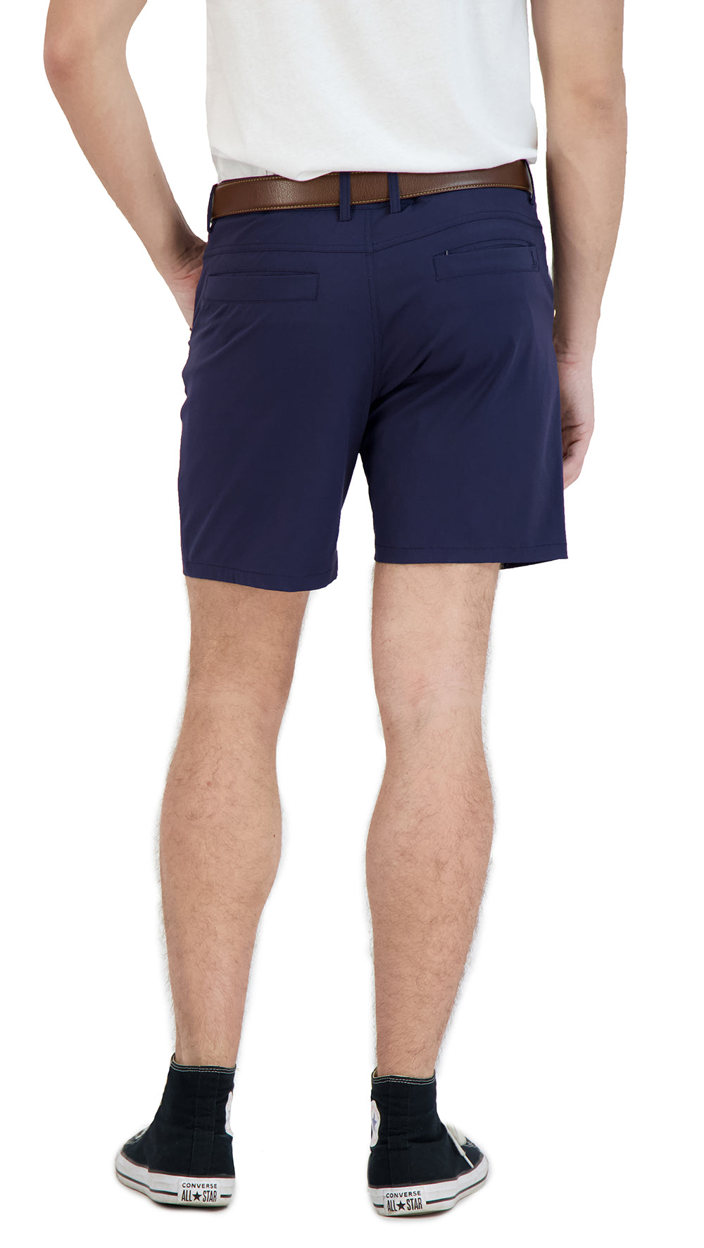 Person wearing navy shorts on a white background