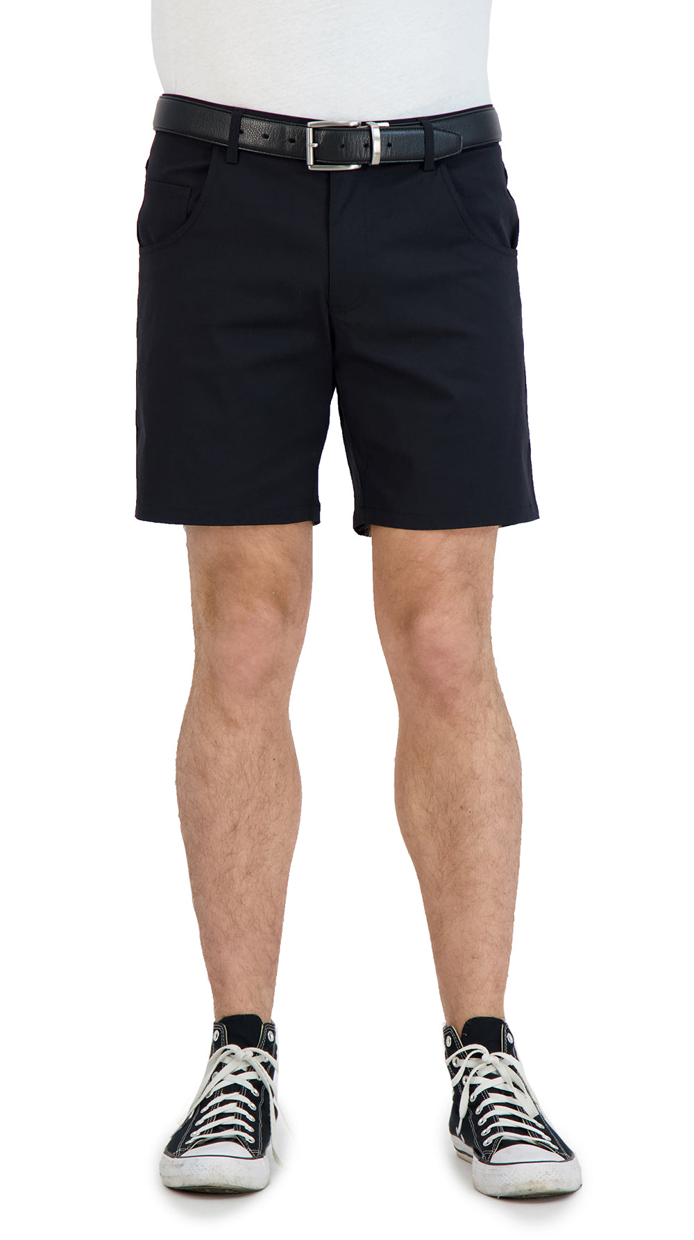 Person wearing black shorts on a white background