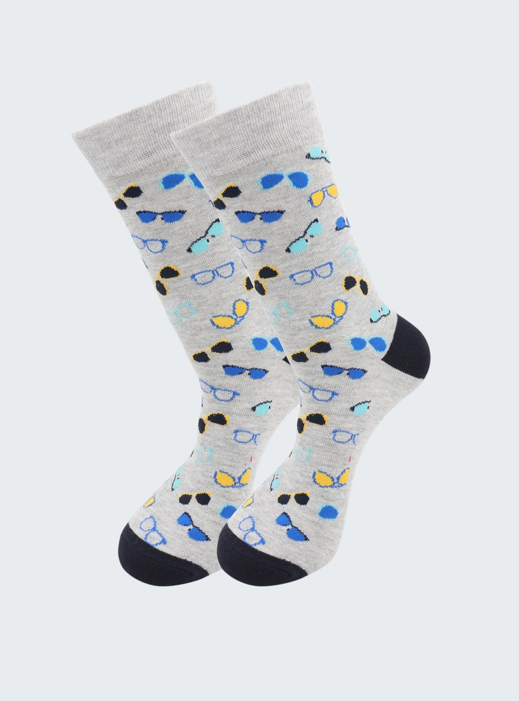 Gray socks with blue, yellow, and black sunglasses pattern on a white background