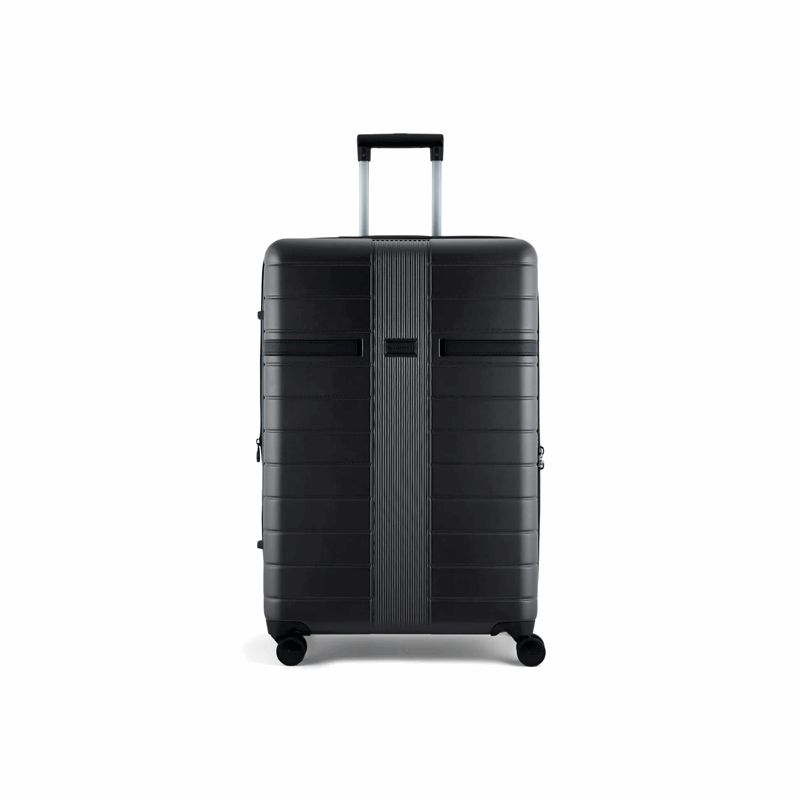 Black suitcase with a textured surface on a white background