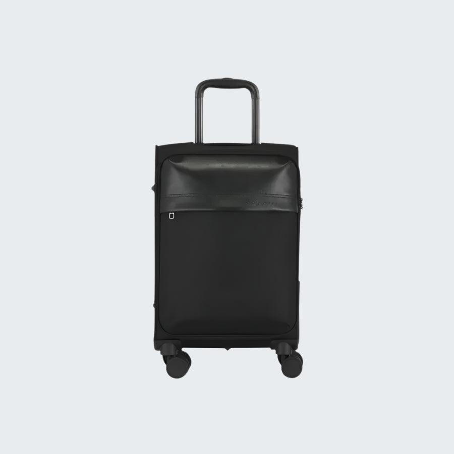 Black suitcase with a leather top on a white background