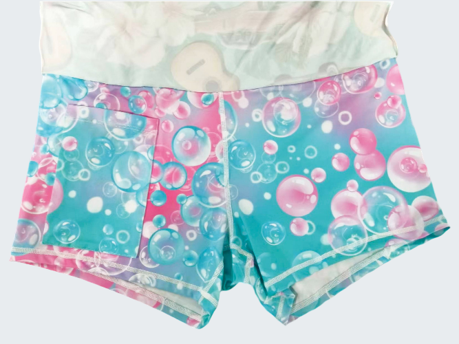 Shorts with bubble pattern on a plain background