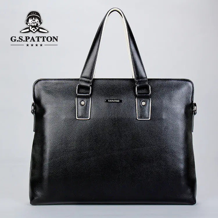 Black leather briefcase with G.S. Patton logo on a gray background