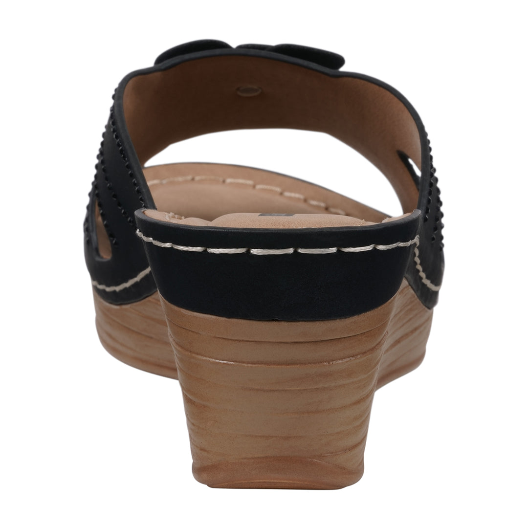 Black and brown sandal on a white background