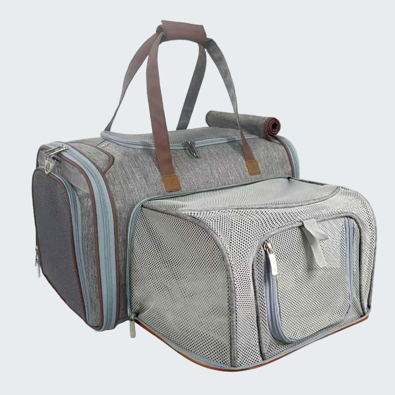 Gray pet carrier with brown handles on a white background